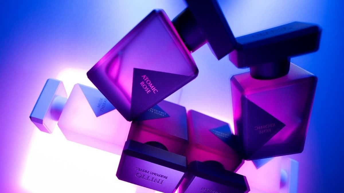 A collection of hair perfumes on a vanity